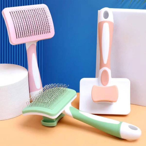 Self-cleaning slicker brush